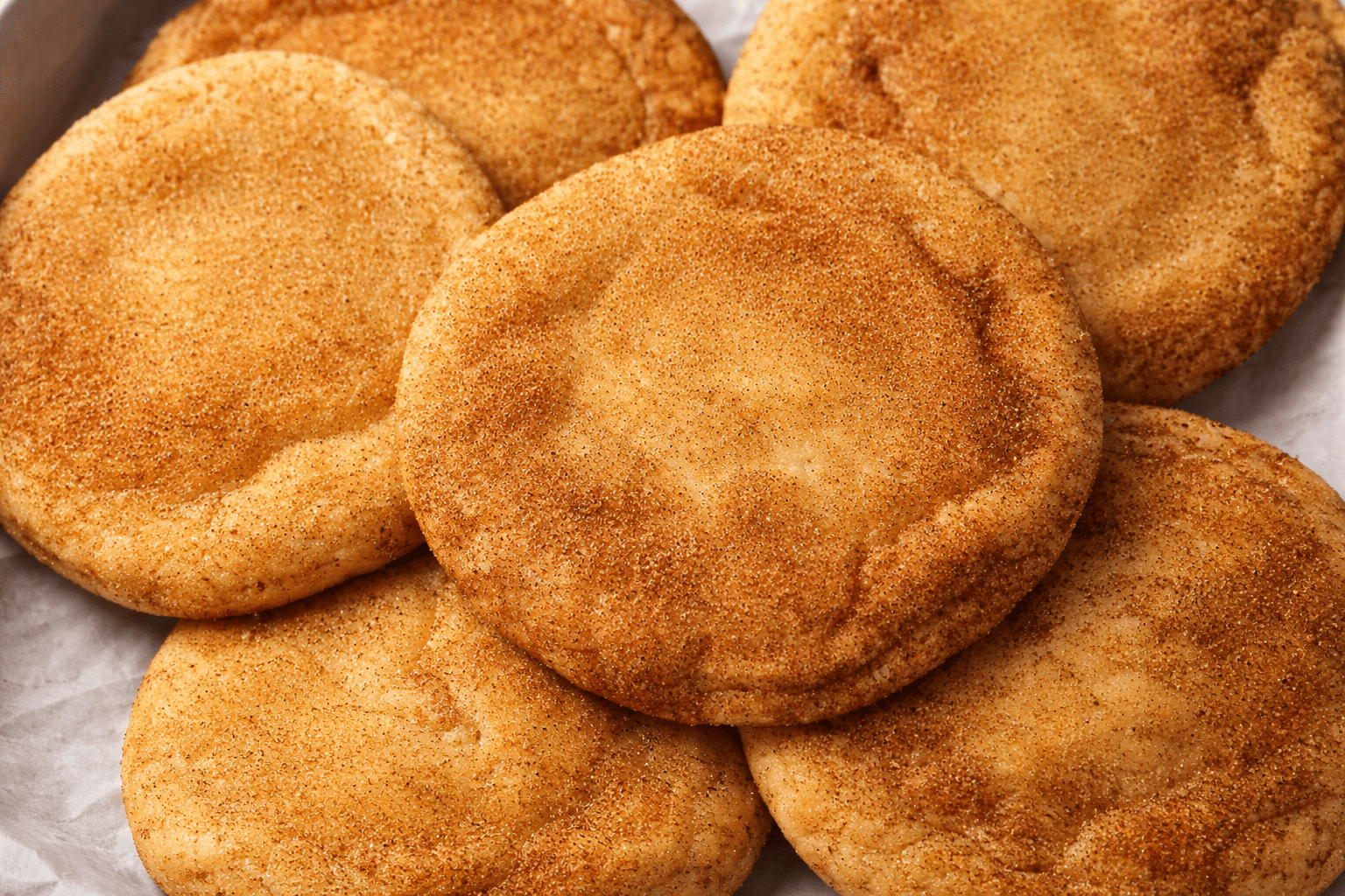 Delicious golden brown snickerdoodle cookies, soft and coated in cinnamon sugar.